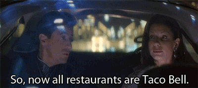 gif of sandra bullock in Demolition Man saying "Now all restaurants are taco bell."