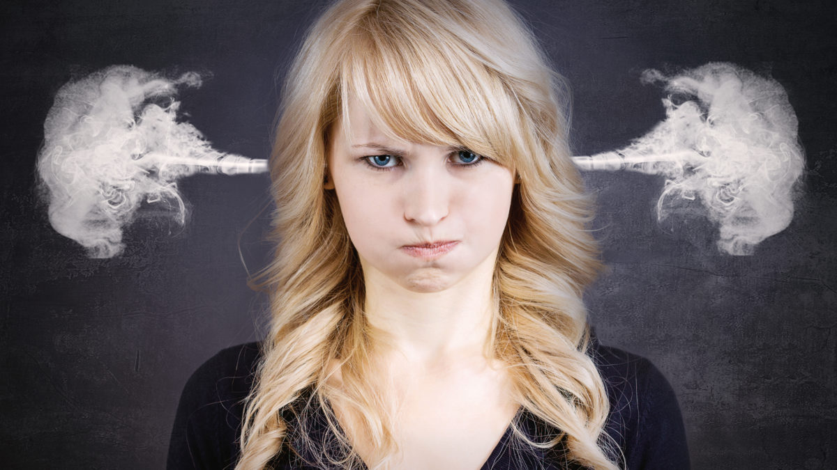 bad reviews, Closeup portrait angry young woman, blowing steam coming out of ears, about to have nervous atomic breakdown, isolated black background