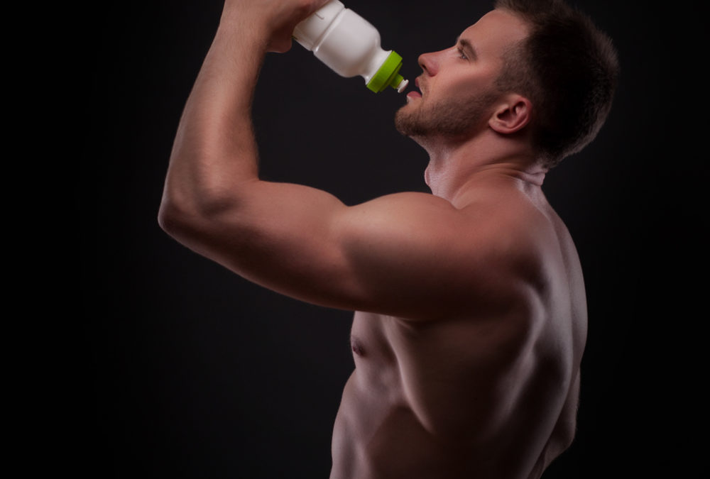 good looking guy drinking water
